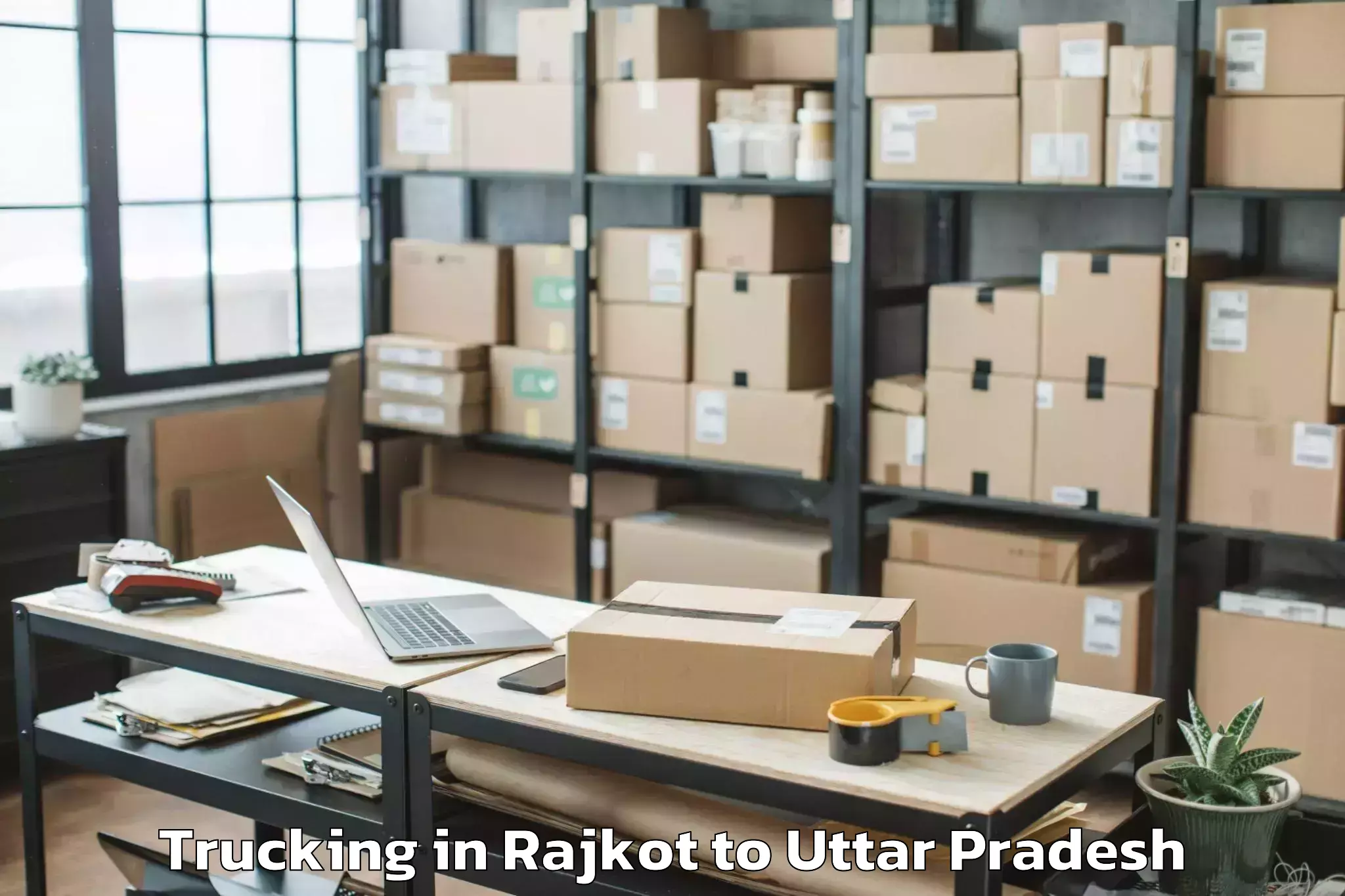 Professional Rajkot to Captainganj Trucking